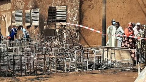 The scene at the school in Niger show remains of desks - Wednesday 14 April 2021