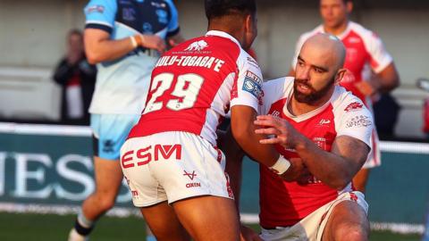 Kane Linnett (right) is helped to his feet in celebration after scoring a try for Hull KR against Batley in the Challenge Cup