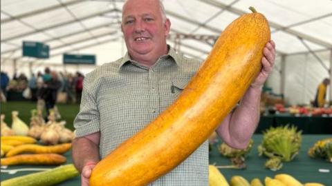 A photo of Vince Sjodin and his 30Ib cucumber