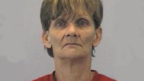 The Goldsboro Police Department provides an image of Marcia Jean Lee, who was arrested on charges of failure to report a death after her mum's body was found inside a reezer sold at a yard sale.