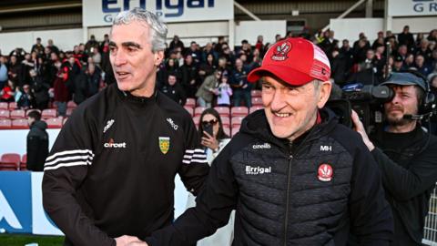 Jim McGuinness and Mickey Harte shake hands after Donegal's win over Derry