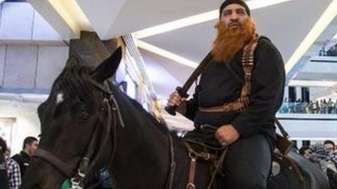 Tweeted picture of a man on a horse with a sword