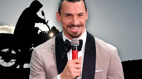 Zlatan Ibrahimovic in dinner jacket with microphone. Motorbike in background.