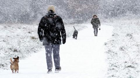 People in the snow in Gateshead on 1 December 2023