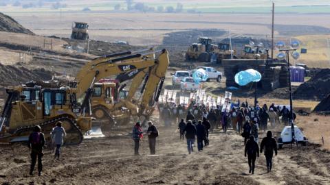 Protesters march along the route of the Dakota Access pipeline near the Standing Rock Indian Reservation in North Dakota. November 11, 201