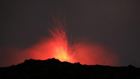 Mount Etna erupting