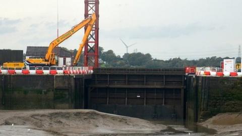 Raised broken hydraulic sea gate at Glasson Dock near Lancaster