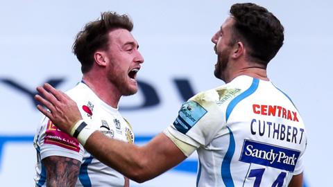 Stuart Hogg and Alex Cuthbert celebrate an Exeter try