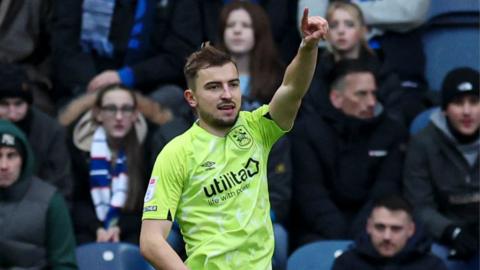 Michal Helik of Huddersfield Town celebrates scoring to make it 1-1 against Blackburn
