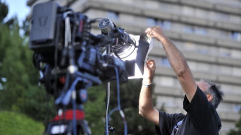 A technician prepares broadcast equipment in Lausanne, Switzerland on 16 June 2014