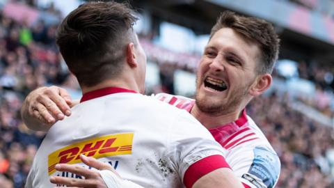 Cadan Murley and Will Edwards celebrate Harlequins' first try