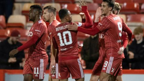 Aberdeen celebrate their quarter-final win over Partick Thistle