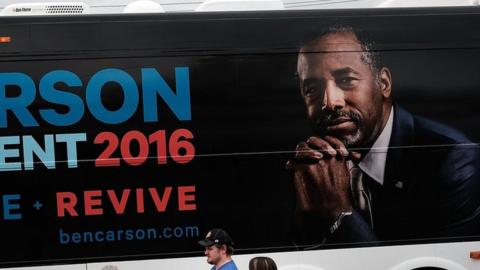 Republican presidential candidate Ben Carson visits voters in a restaurant during the Republican presidential primary on February 20, 2016 in Spartanburg, South Carolina