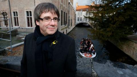 Catalan leader in exile Carles Puigdemont looks on during a visit to the city of Bruges on November 25, 2017.