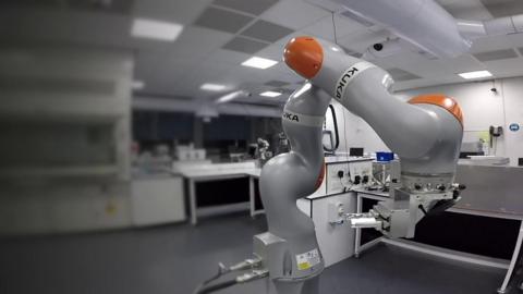 Robotic arm in scientific laboratory