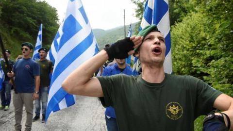 Protesters chant the Greek national anthem during a demonstration against the agreement reached by Greece and Macedonia to resolve a dispute over the former Yugoslav republic's name, in Pisoderi village, northern Greece, 17 June 2018