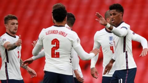 England celebrate after scoring against Belgium