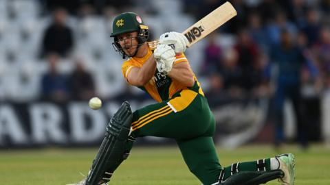 Matthew Montgomery of Notts Outlaws sweeps the ball across the leg side