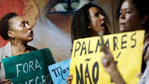 Demonstrators protest against statements that minimize racism in Brazil given by the new president of the Palmares Foundation