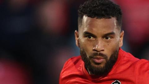 Adrian Mariappa helped Salford City reach the League Two play-offs last term and played in both semi-finals against Stockport County in May