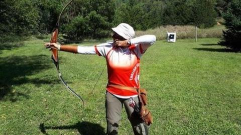 Lesley Sleight shoots an arrow