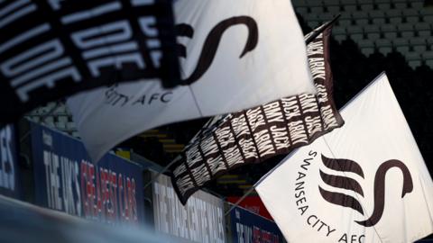 Swansea flags at the Swansea.com Stadium