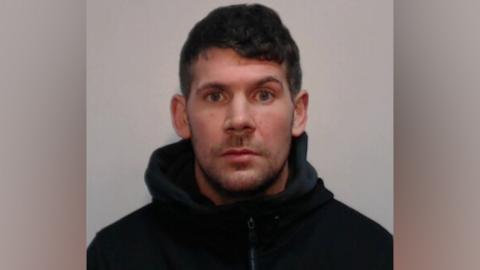 Joshua Avis, 38, is wanted by police in connection with a £26m drug ring