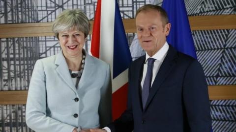 Theresa May and Donald Tusk at December's EU summit