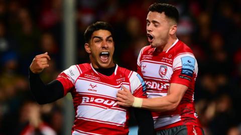 Santiago Carreras celebrates his try for Gloucester