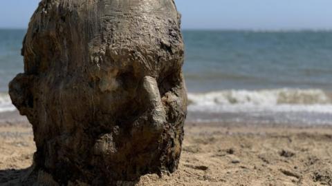 Bronze head sculpture