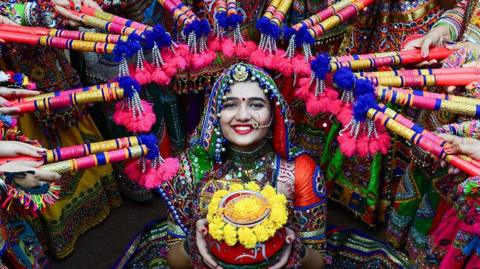 A woman prepares for the festival of Navaratri in Ahmedabad