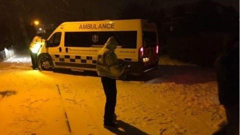 Ambulance stuck in snow