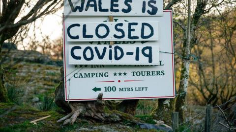 A sign implores tourists to stay away and that Wales is closed during the pandemic lockdown on April 08, 2020 in Betws-y-Coed, Wales.