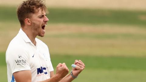 Ben Coad celebrates a wicket for Yorkshire against Hampshire