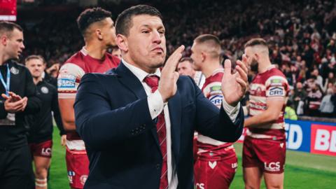 Matt Peet applauds as Wigan take a lap of honour at Old Trafford