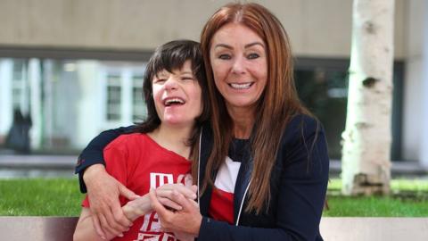 Billy Caldwell, 12, and mother Charlotte Caldwell leave the 鶹Լ Office on June 11