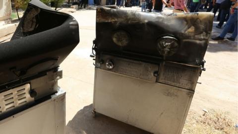 Burnt incubators outside the Yarmouk Hospital in Baghdad after a fire that killed 12 babies (10 August 2016)