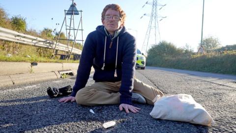 Protestor on a road