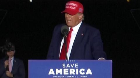 Donald Trump speaking on stage