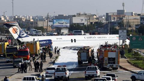 Caspian Airlines passenger plane on highway in Mahshahr, Iran