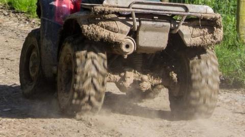 Quad bike farmer