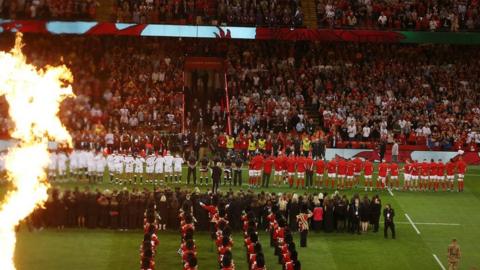 The players lining up for national anthems when Wales played England