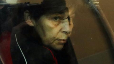 Patricia Dagorn, a woman suspected of being a serial poisoner trapping wealthy widowers from the Cote d"Azur, is seen in a car as she arrives at court in Nice, south-eastern France, on 15 January 2018 to attend her trial