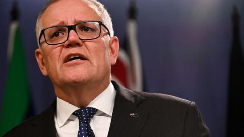 Australia's former prime minister Scott Morrison speaks to media during a press conference in Sydney on August 17, 2022.