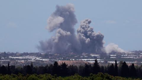 Smoke rises over the Gaza Strip, amid continued fighting between Israel and Hamas, as seen from southern Israel (6 May 2024)