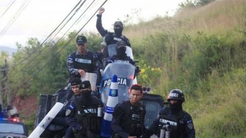 Members of the Honduran police arrive at their headquarters to take part in a strike to demand higher wages and rest after working extra hours due to protests caused by the delay in vote counting in the general election, in Tegucigalpa, Honduras, December 4, 2017.