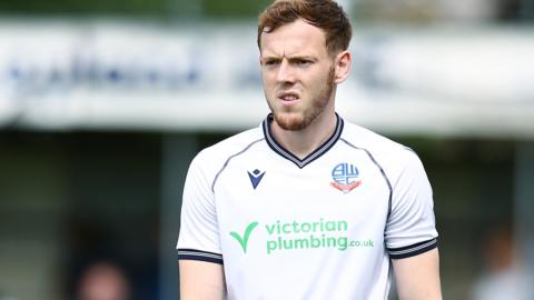 George Johnston in action for Bolton