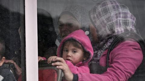 File pic of refugees waiting at a camp in Lesbos, Greece