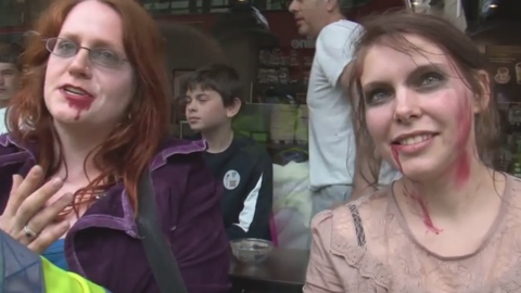 Zombie protesters being arrested in London