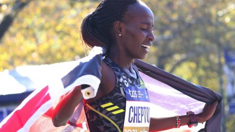 Viola Cheptoo Lagat celebrates her second place at the 2021 New York Marathon